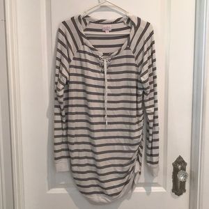 This is a maternity long sleeve shirt/dress.